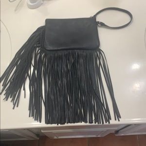 Carlos Santana fringe wristlet